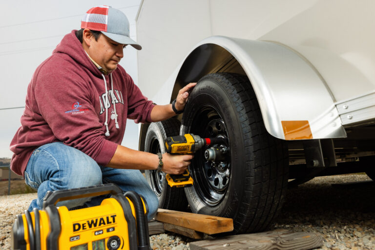Trailer Service Department fixing a trailer tire.