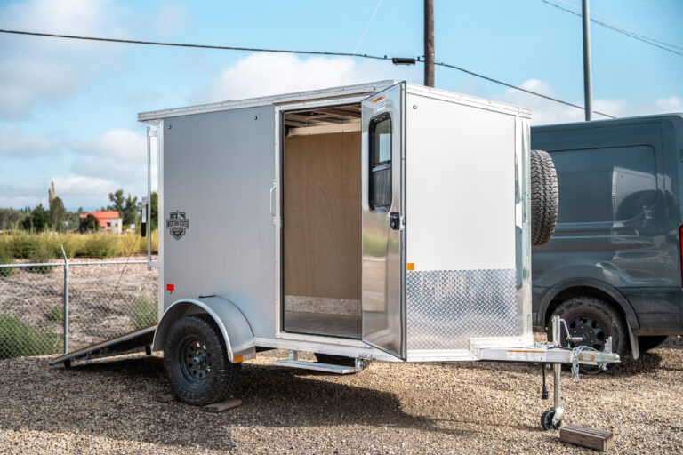 custom trailer with offroad tires, special doors.
